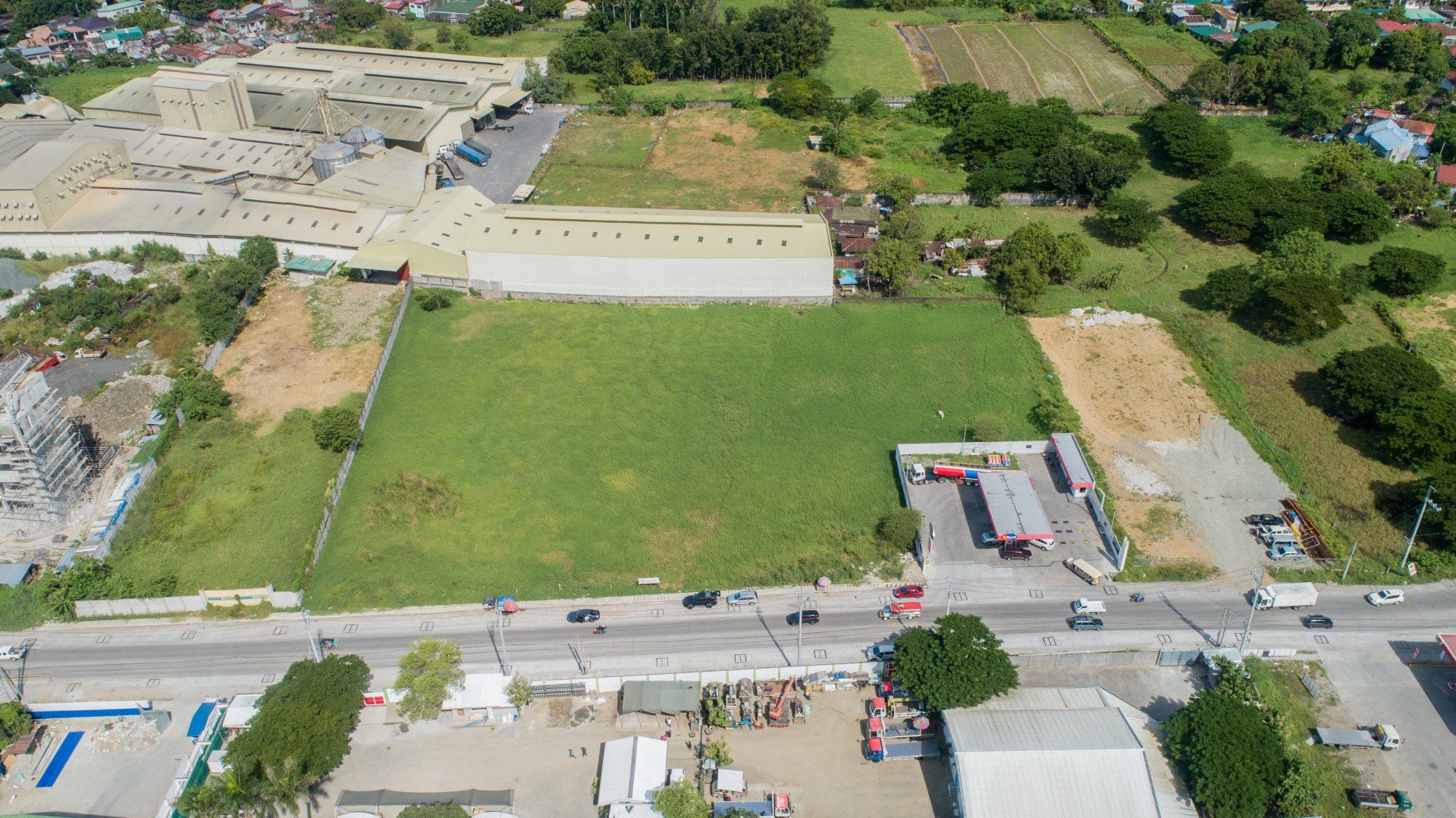 An aerial view of a city with a lot of buildings and trees.