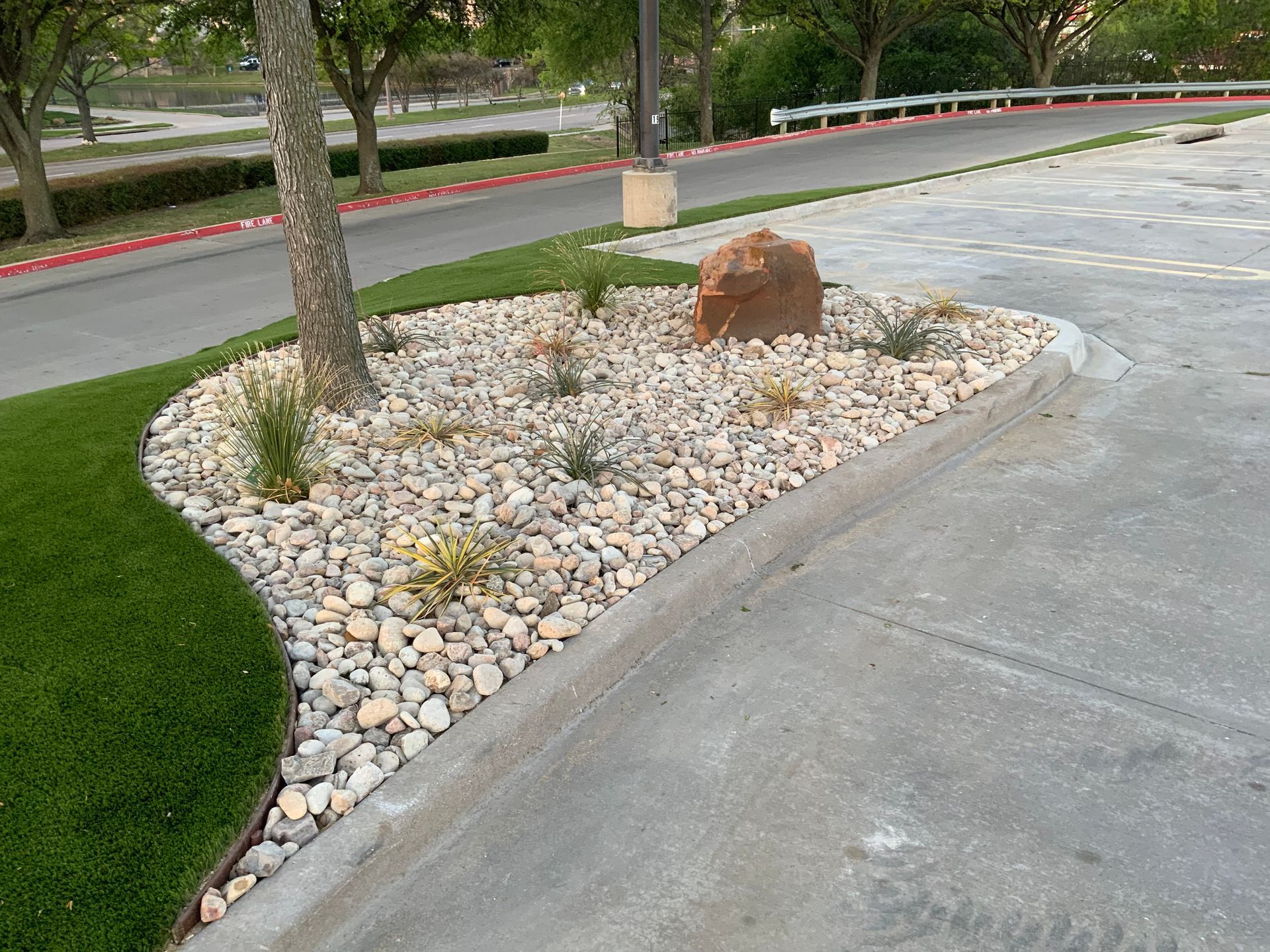 Artificial Turf is used on a landscape island. 