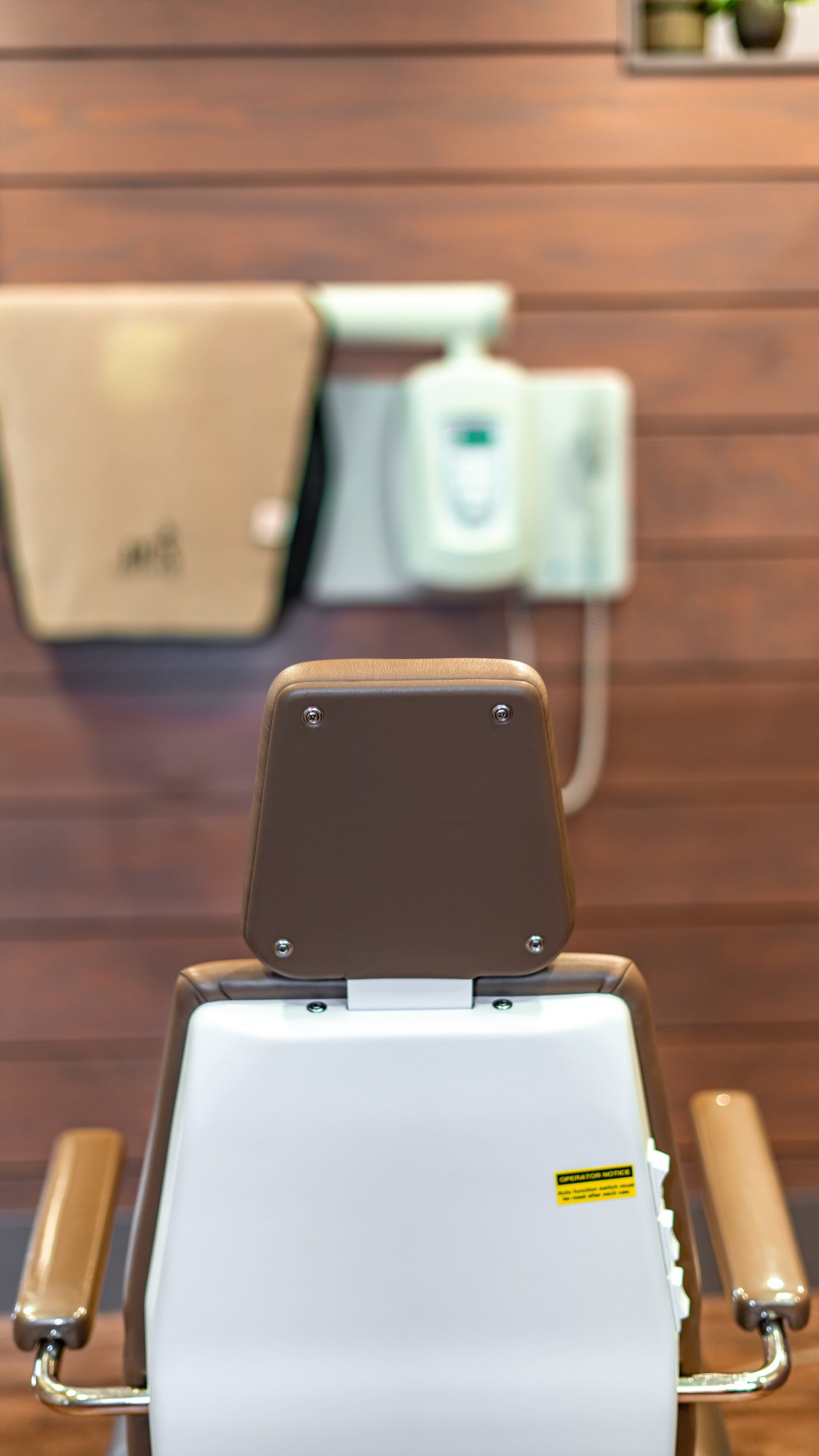 A close up of a barber chair in a barber shop.