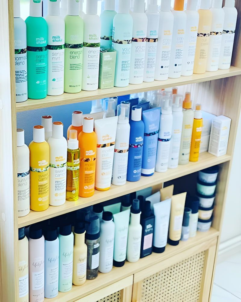A Shelf Filled With A Variety Of Hair Products — Howard Street Hair Studio In Nambour, QLD