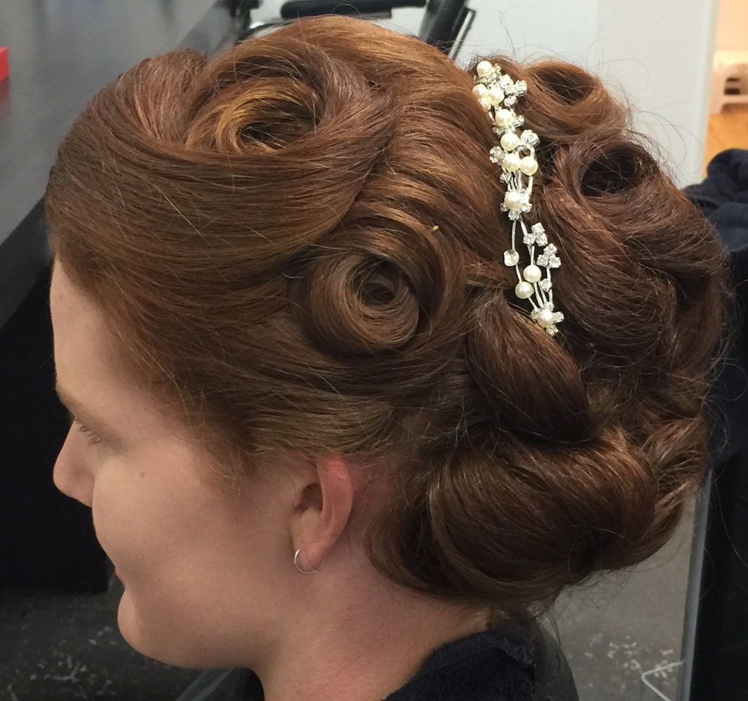 A Woman Is Wearing A Headband With Pearls In Her Hair — Howard Street Hair Studio In Nambour, QLD