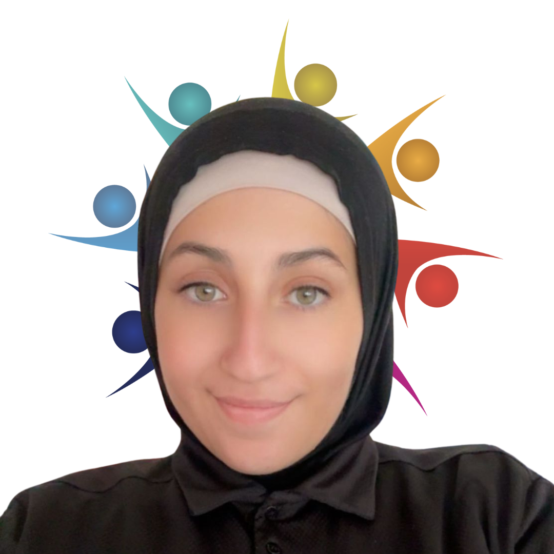 A woman wearing a hijab is smiling with a group of people behind her