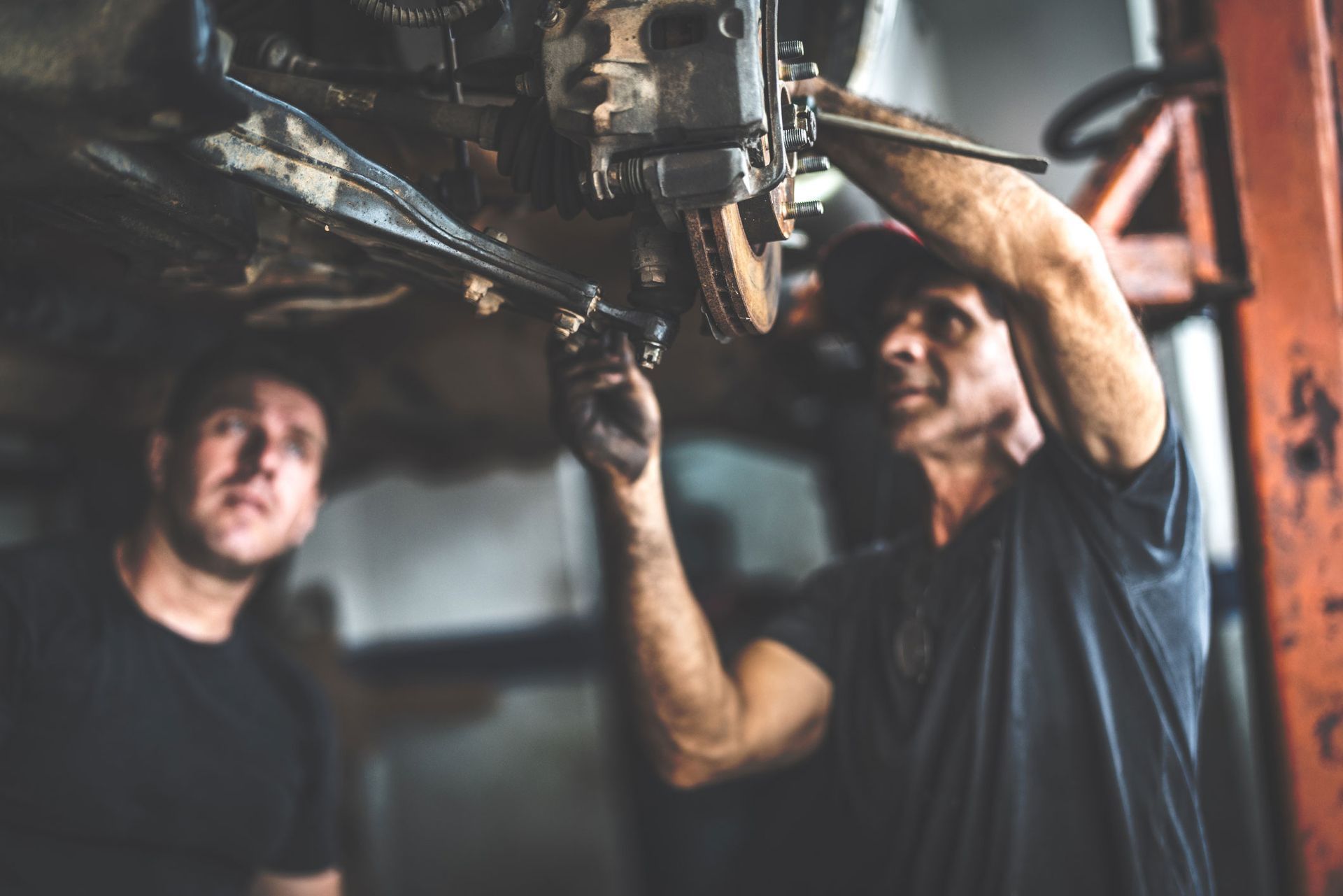 Two Men Fixing A Car | Brainard, NE | CTF Service Inc