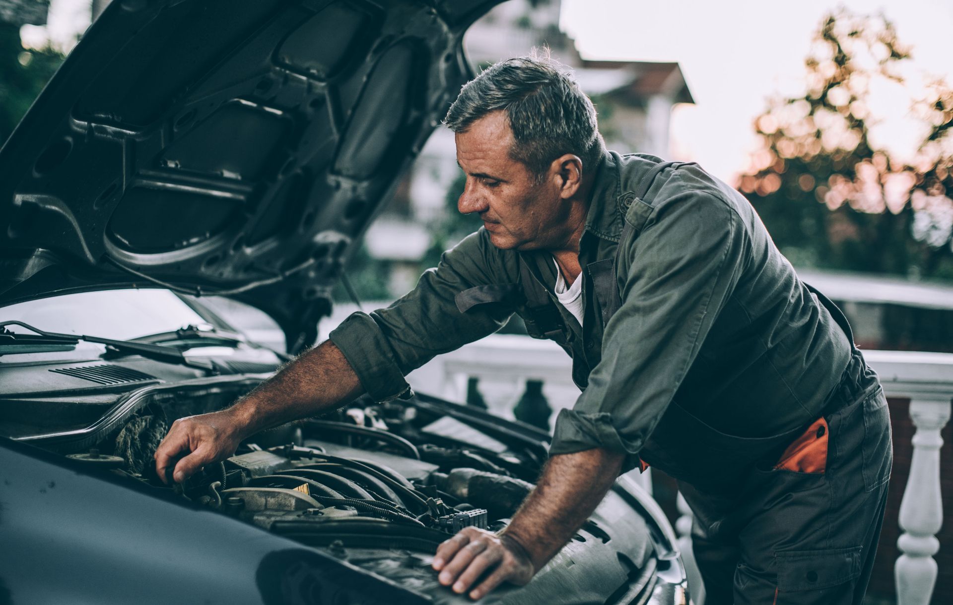Man Repairing Car Issue | Brainard, NE | CTF Service Inc