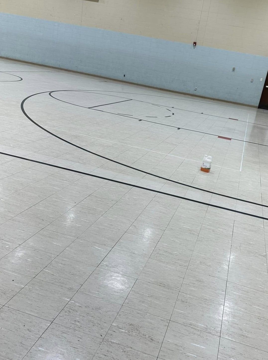 Before image of a dull commercial floor before waxing in Telford, PA.