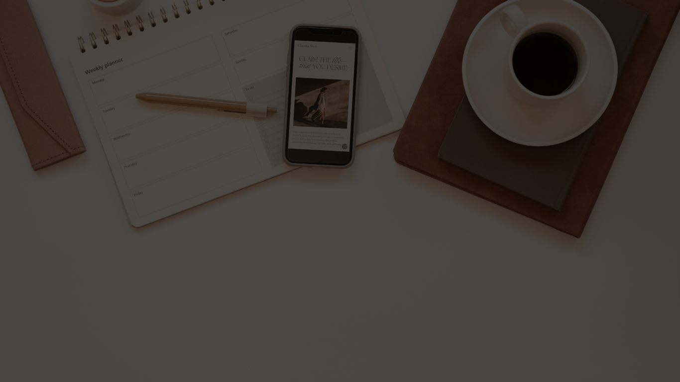 A desk with a cup of coffee , a cell phone , a notebook and a ruler.