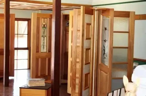 Room With Lots of Wooden Doors and Windows — Payless Timbers in Cairns, QLD