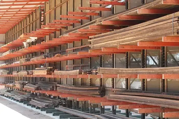 Warehouse Filled With Lots of Wooden Shelves — Payless Timbers in Tolga, QLD