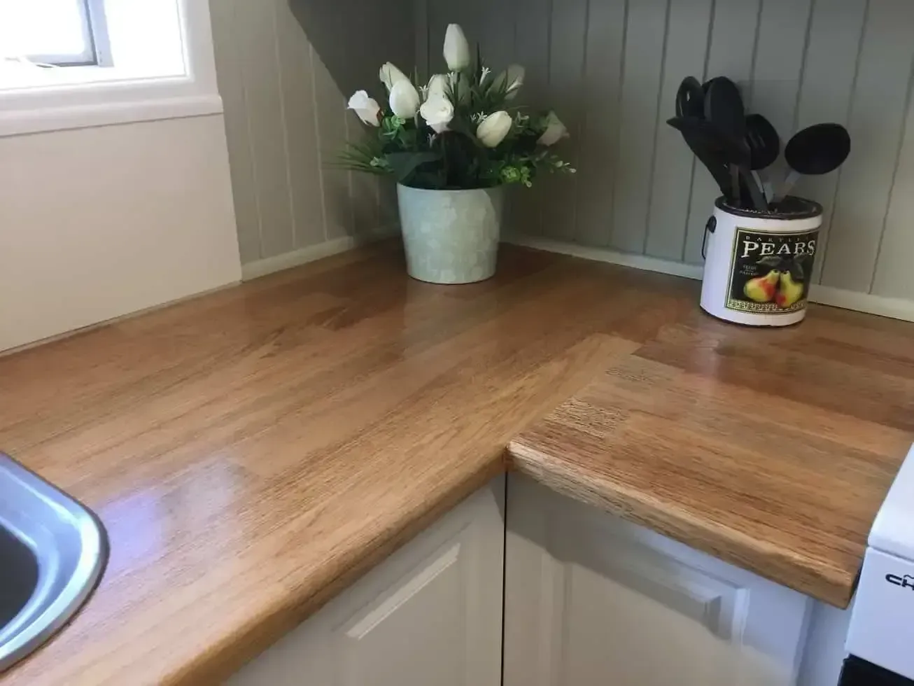 Kitchen Counter With a Can of Pears on It — Payless Timbers in Port Douglas, QLD