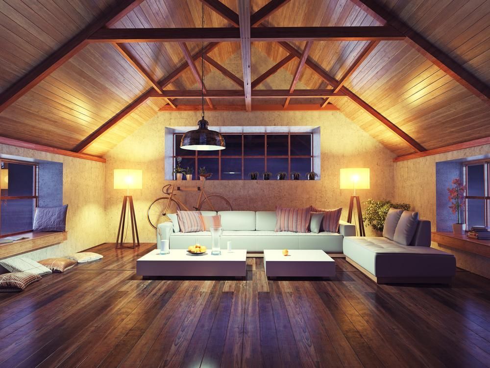 Living Room With a Couch and Two Coffee Tables in an Attic — Payless Timbers in Tablelands, QLD