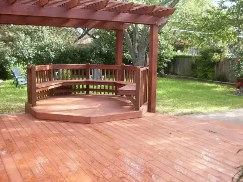 Wooden Deck With a Bench Under a Pergola — Payless Timbers in Cassowary Coast, QLD