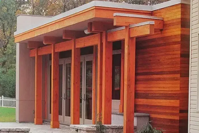 House With Wooden Siding and a Covered Porch — Payless Timbers in Cairns, QLD
