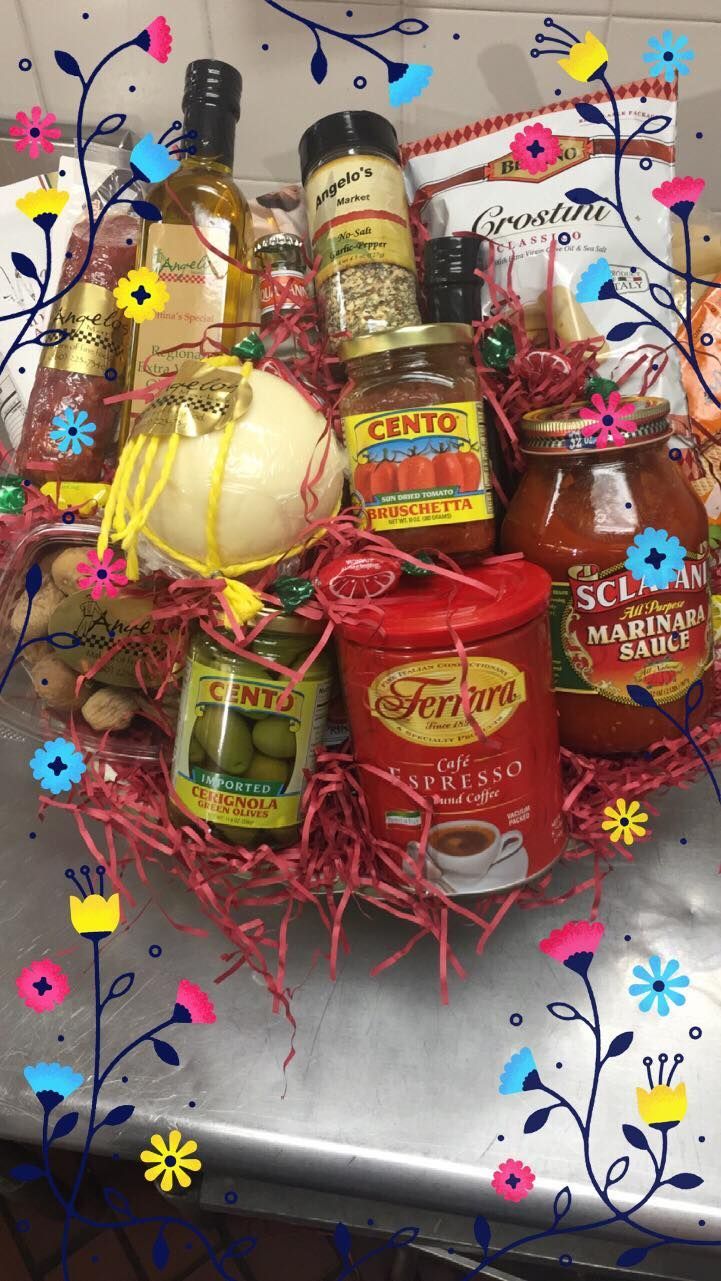 A basket filled with bottles and jars of food on a table.