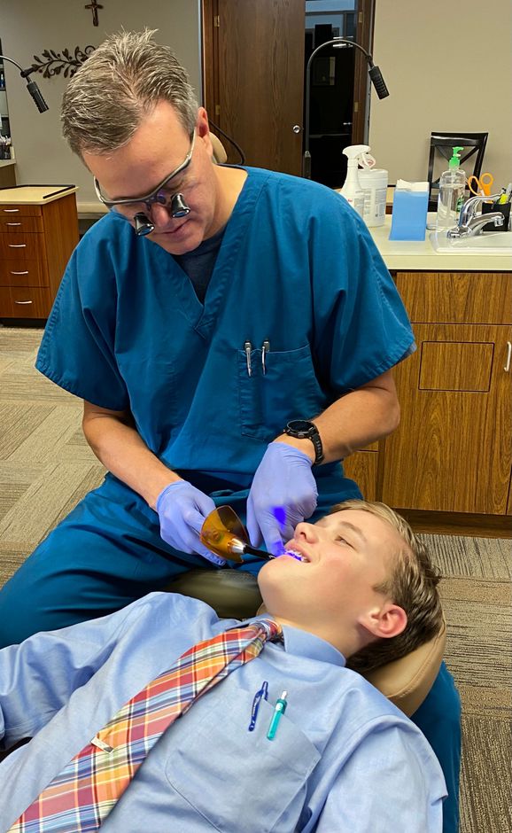Dr Thomas Borgula working on patient