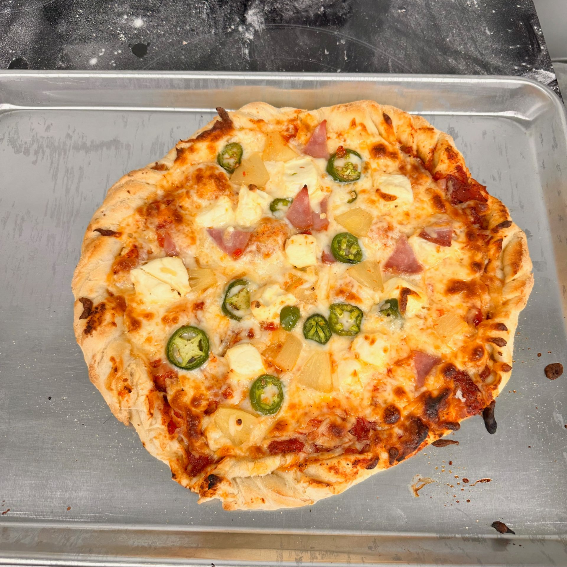 A close up of a pile of biscuits on a table.