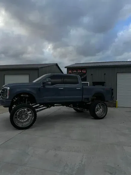 Black lifted pickup truck with