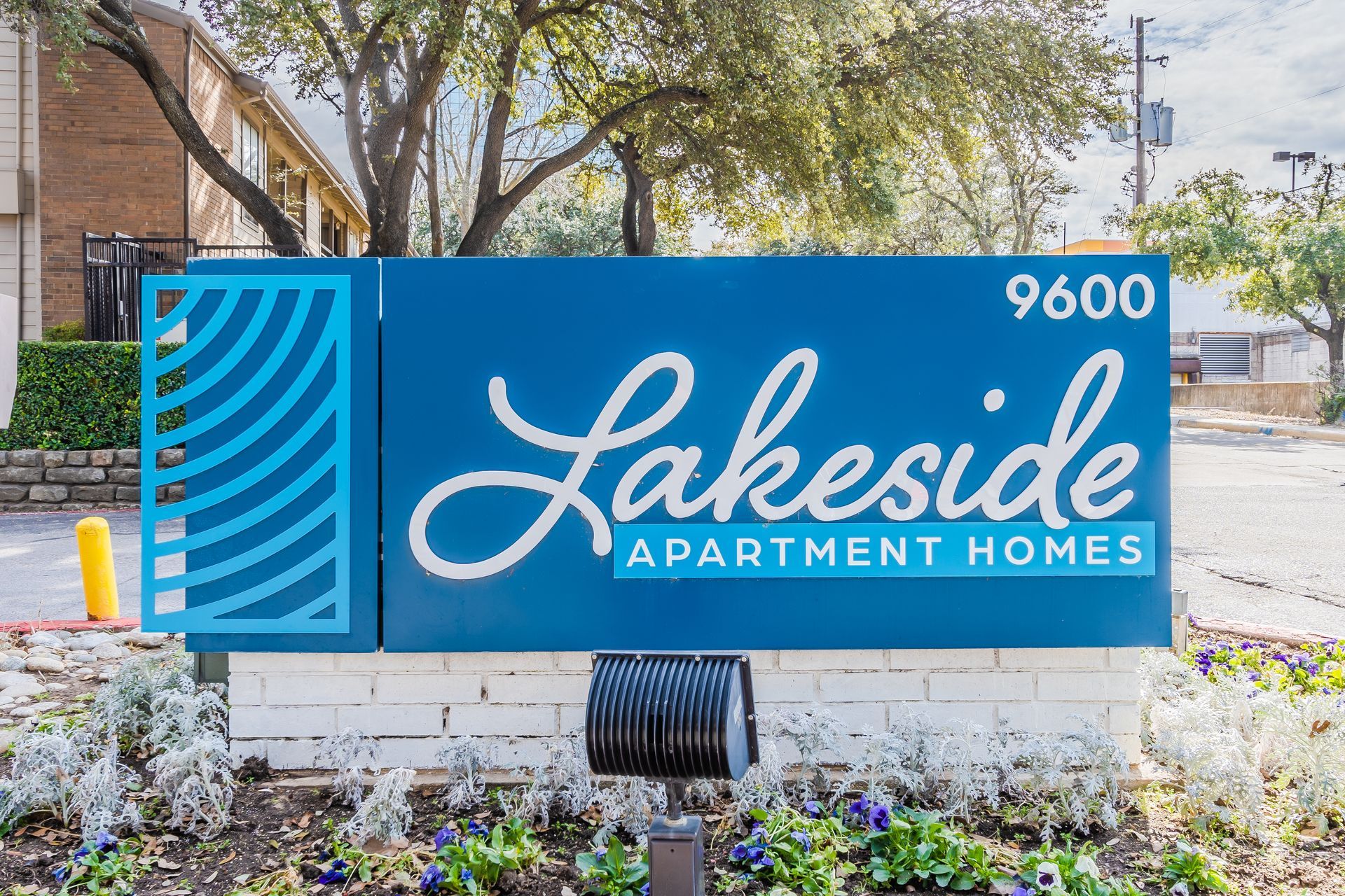 Photo of the sign at the entrance to the community, reading it's name