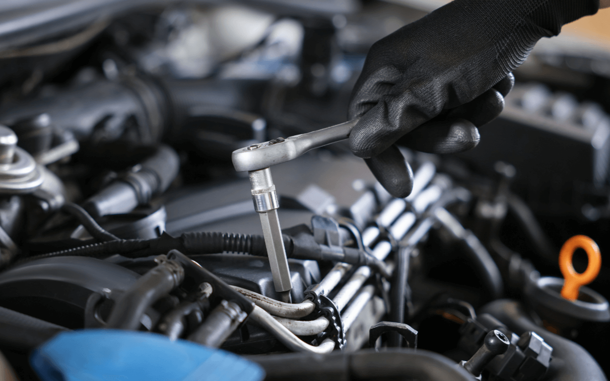 a mechanic doing a car repair