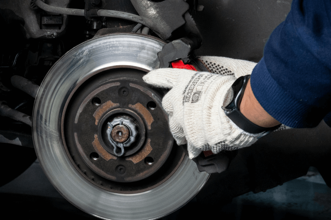 mechanic doing a brake repair