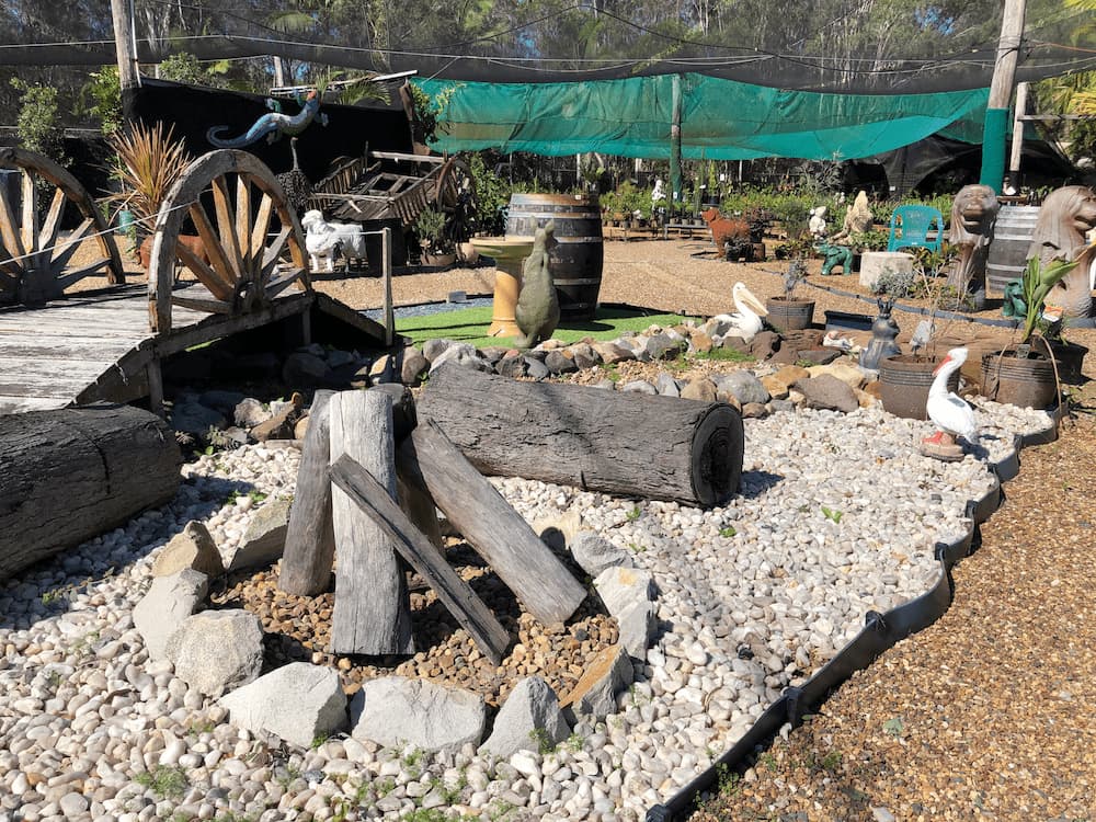 Fire Pit & Wooden Bridge Design - Plants and Landscaping Supplies in Walligan, QLD