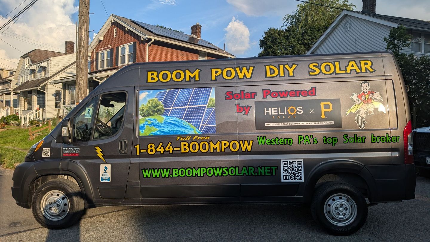 A van that says boom pow diy solar on it