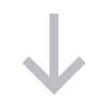 A gray arrow pointing down on a white background.