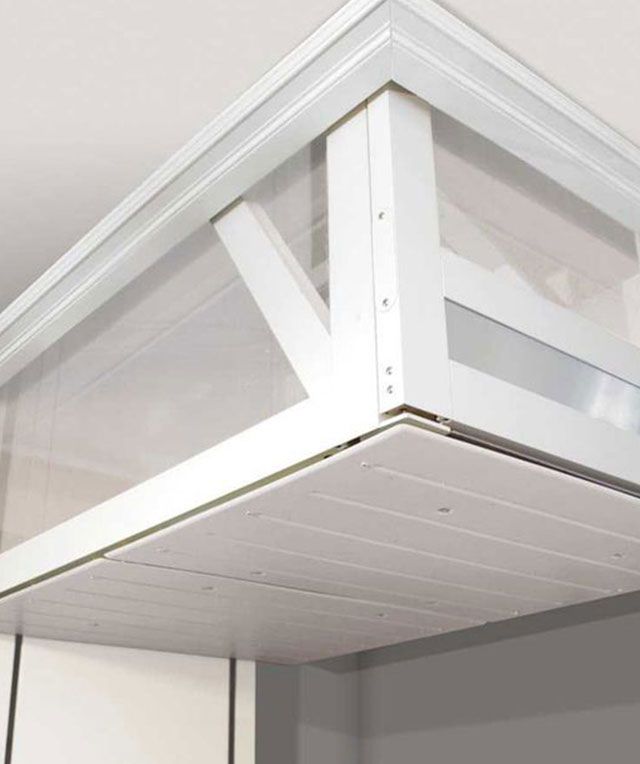 A White Ceiling with A Clear Shelf Underneath It — Master Lifts Cairns in Cairns, QLD