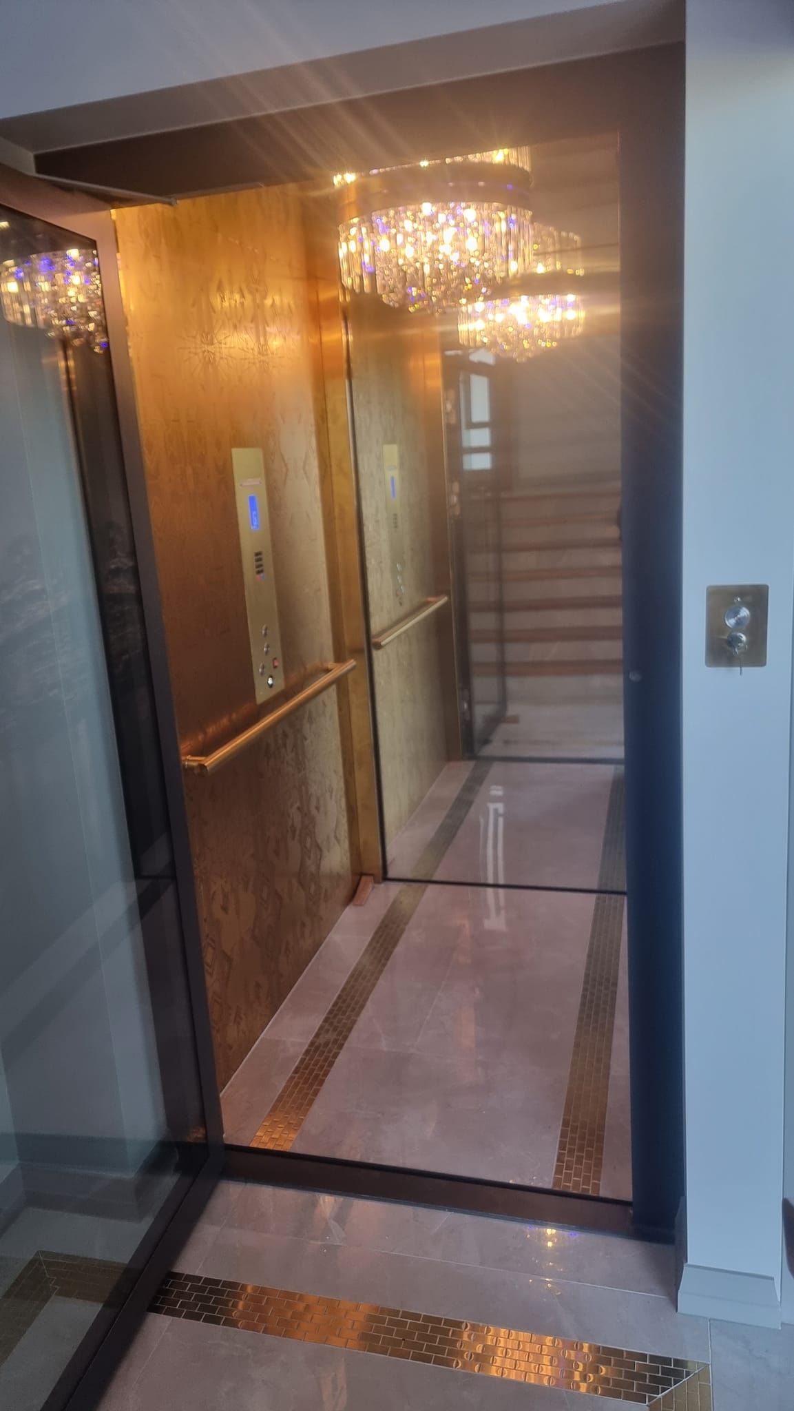 An Elevator Is Going up A Set of Stairs in A Building — Master Lifts Cairns in Atherton Tablelands, QLD