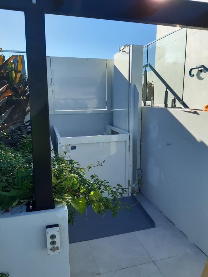 A White Box with A Remote Control on The Side of It — Master Lifts Cairns in Cairns, QLD