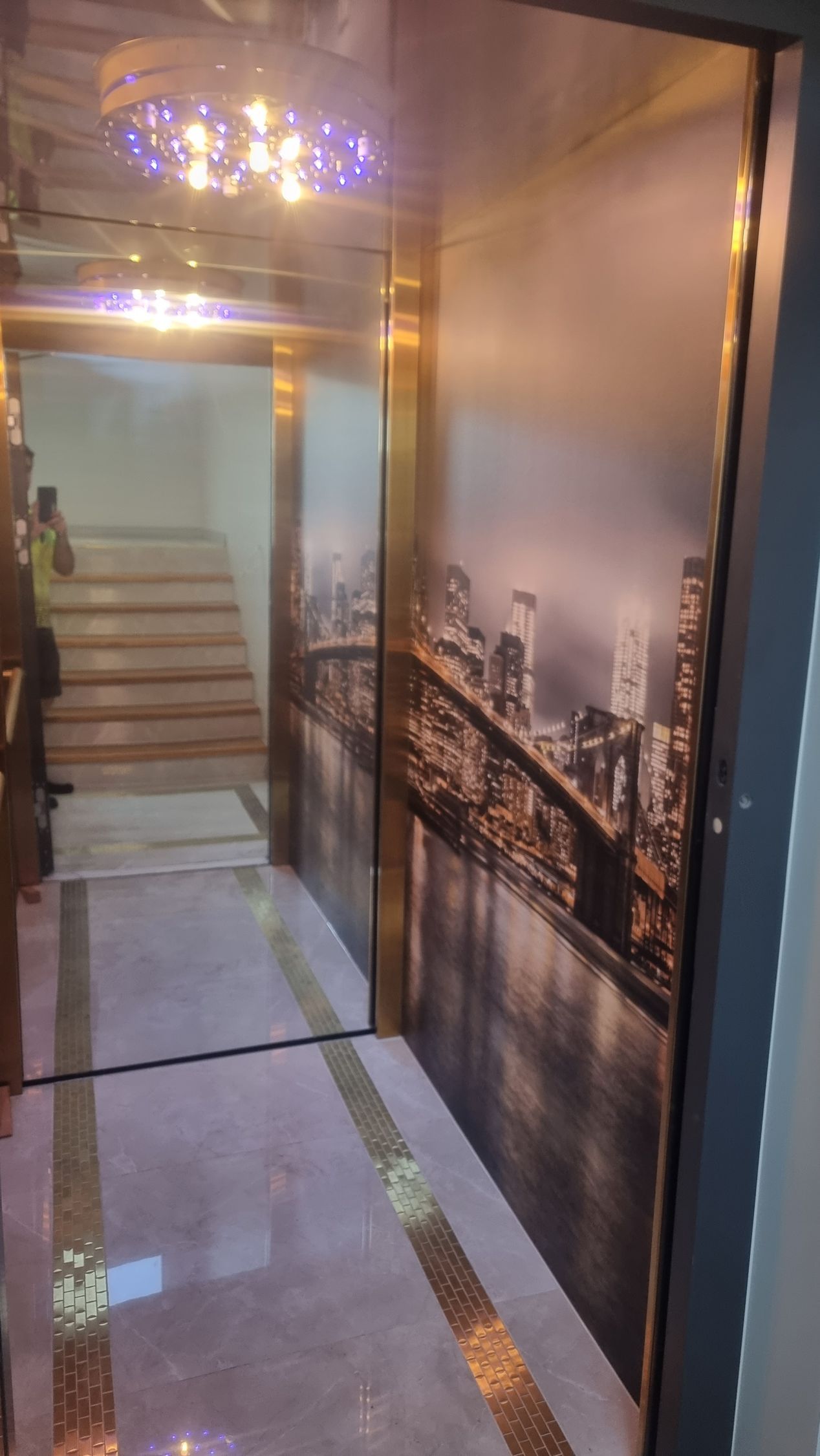 A Hallway with A Picture of A City on The Wall — Master Lifts Cairns in Cairns, QLD