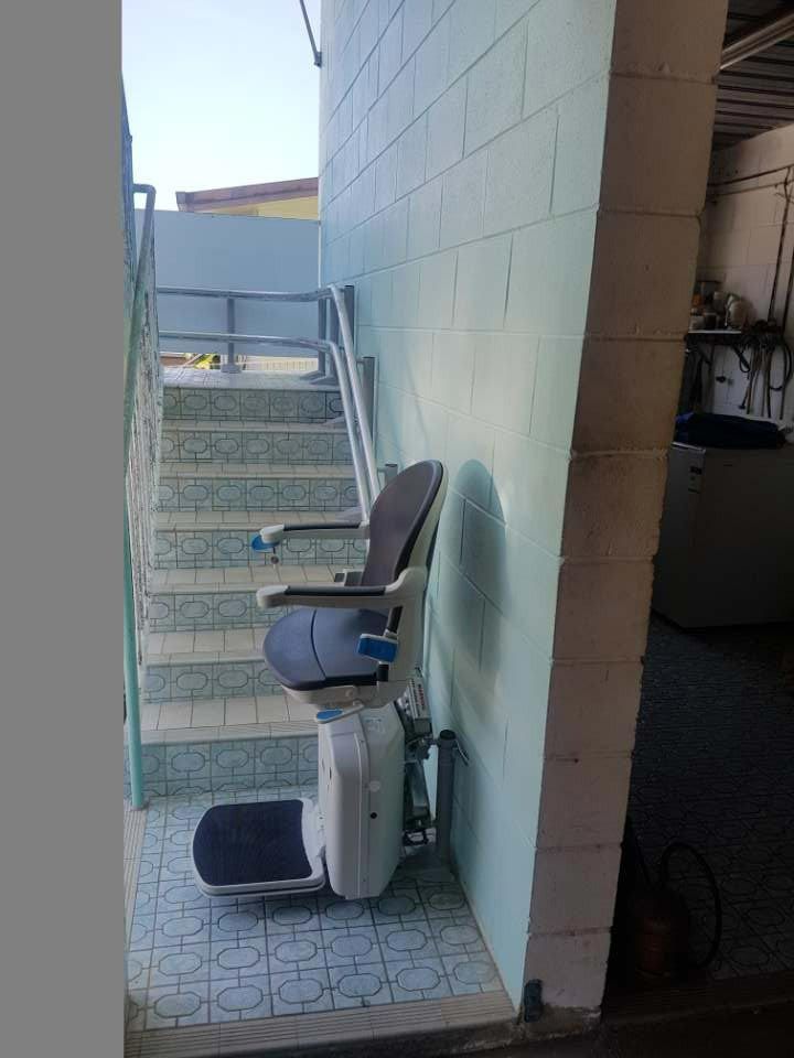 Stairlift With Railings Leading To Different Levels