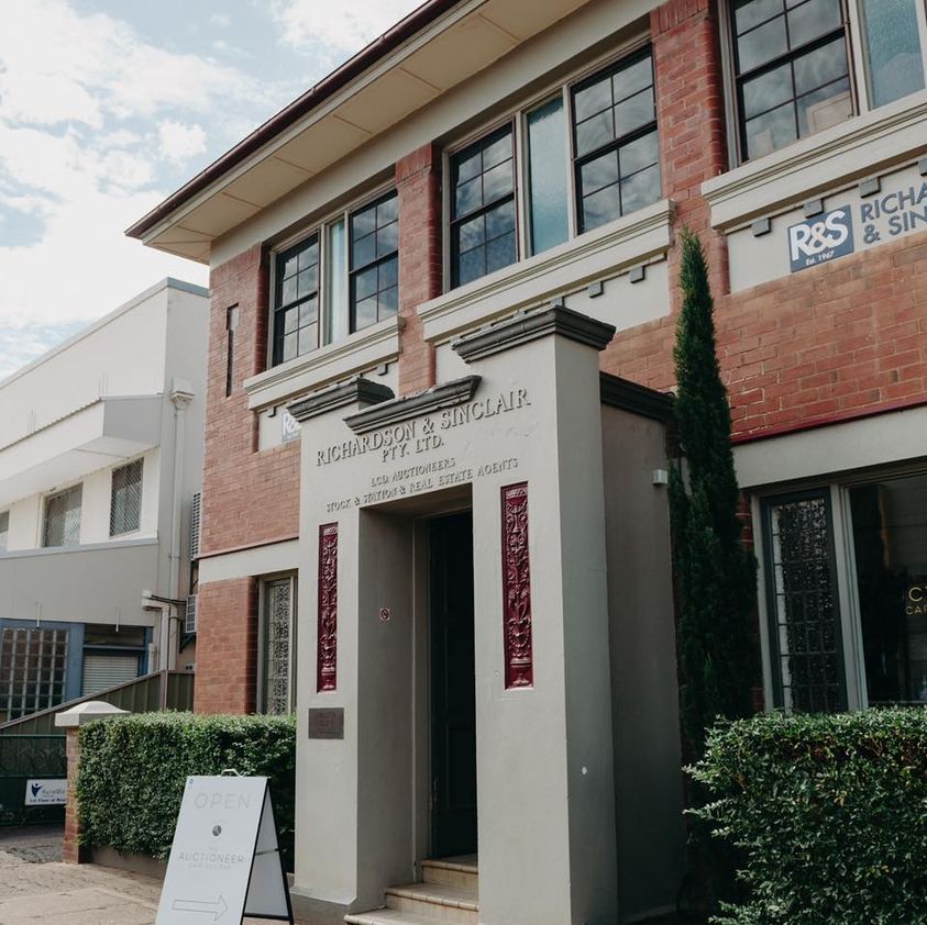 The Auctioneer Cafe by Coffee Bean Roasting House outside of the heritage building in Dubbo