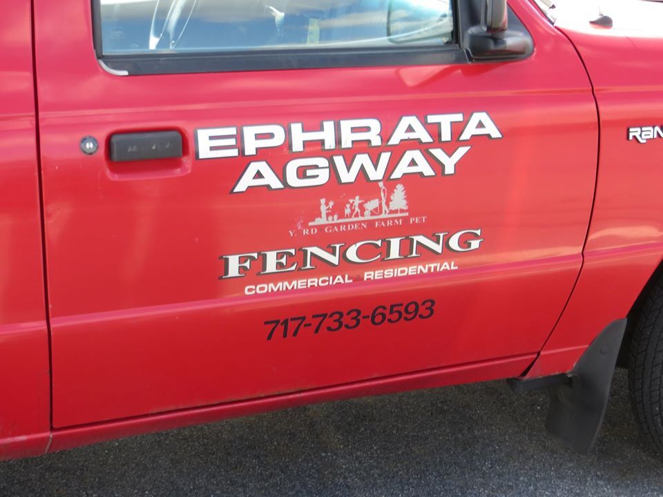 Red truck door with white lettering for 