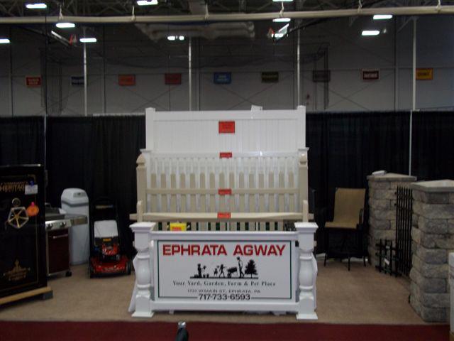 Ephrata Agway booth with white fence display at a trade show. Sign: 