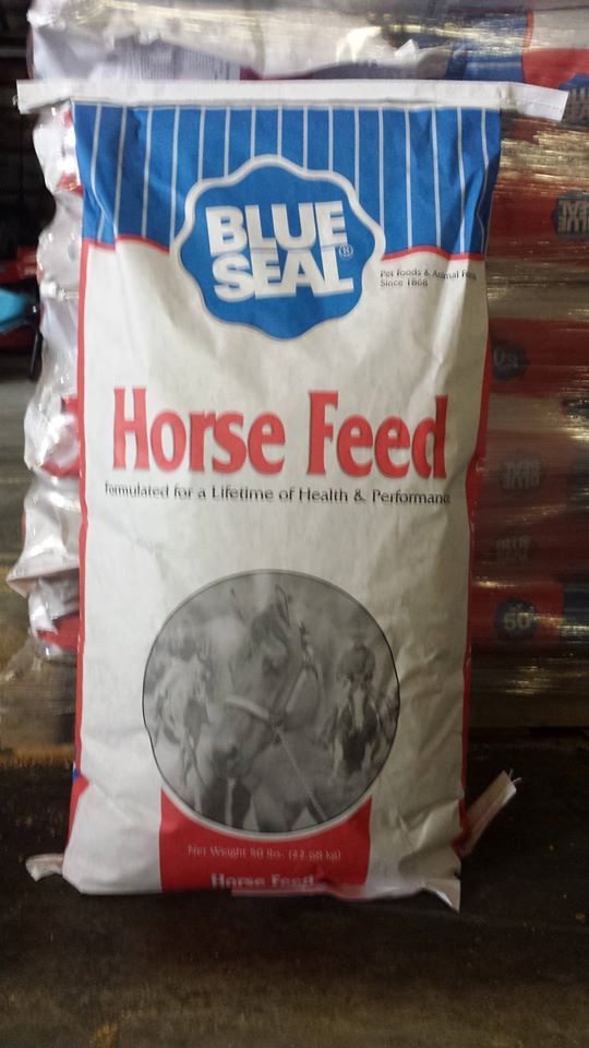 Blue Seal Horse Feed bag, white with blue stripes, red accents, and photo of horses.