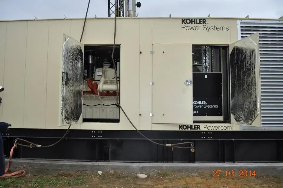A kohler power systems generator with its doors open