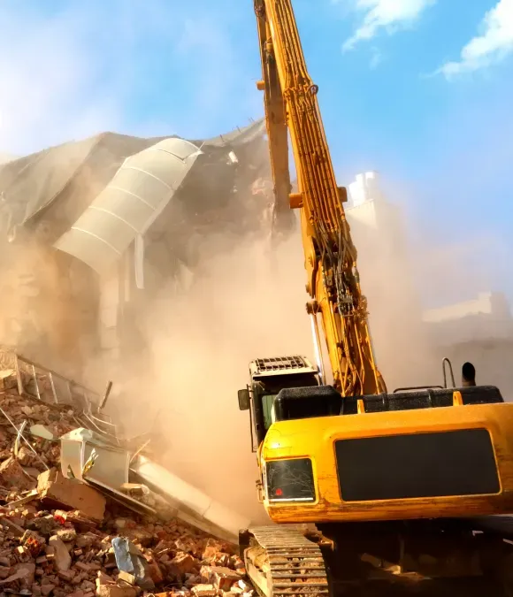 machine demolishing a building