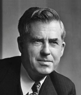 Black-and-white portrait of Henry A. Wallace, wearing a suit and tie, looking toward the right.