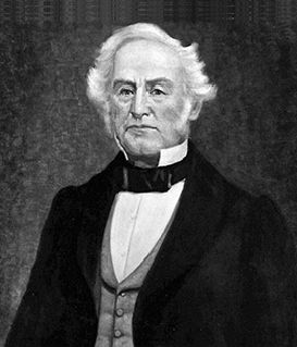 Portrait of George Peabody, depicted from the chest up, wearing a dark coat, light vest, and black cravat.