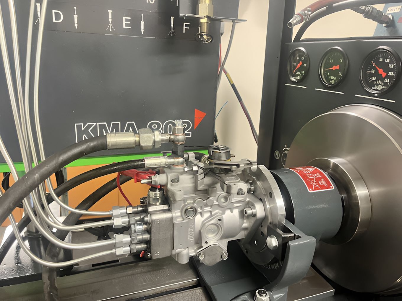 A Diesel Engine Is Being Tested On A Machine — AMC Diesel Fuel Injection Services In Paget, QLD