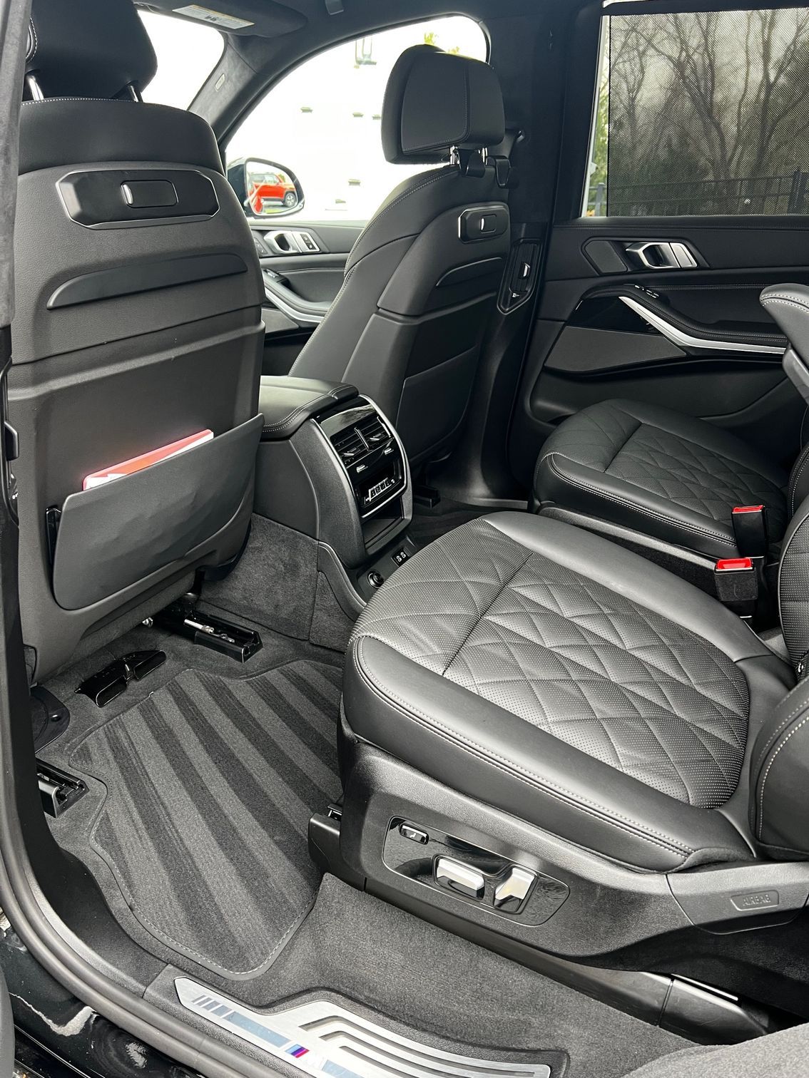 Cleaned and conditioned leather interior after luxury car detailing service in New Jersey.