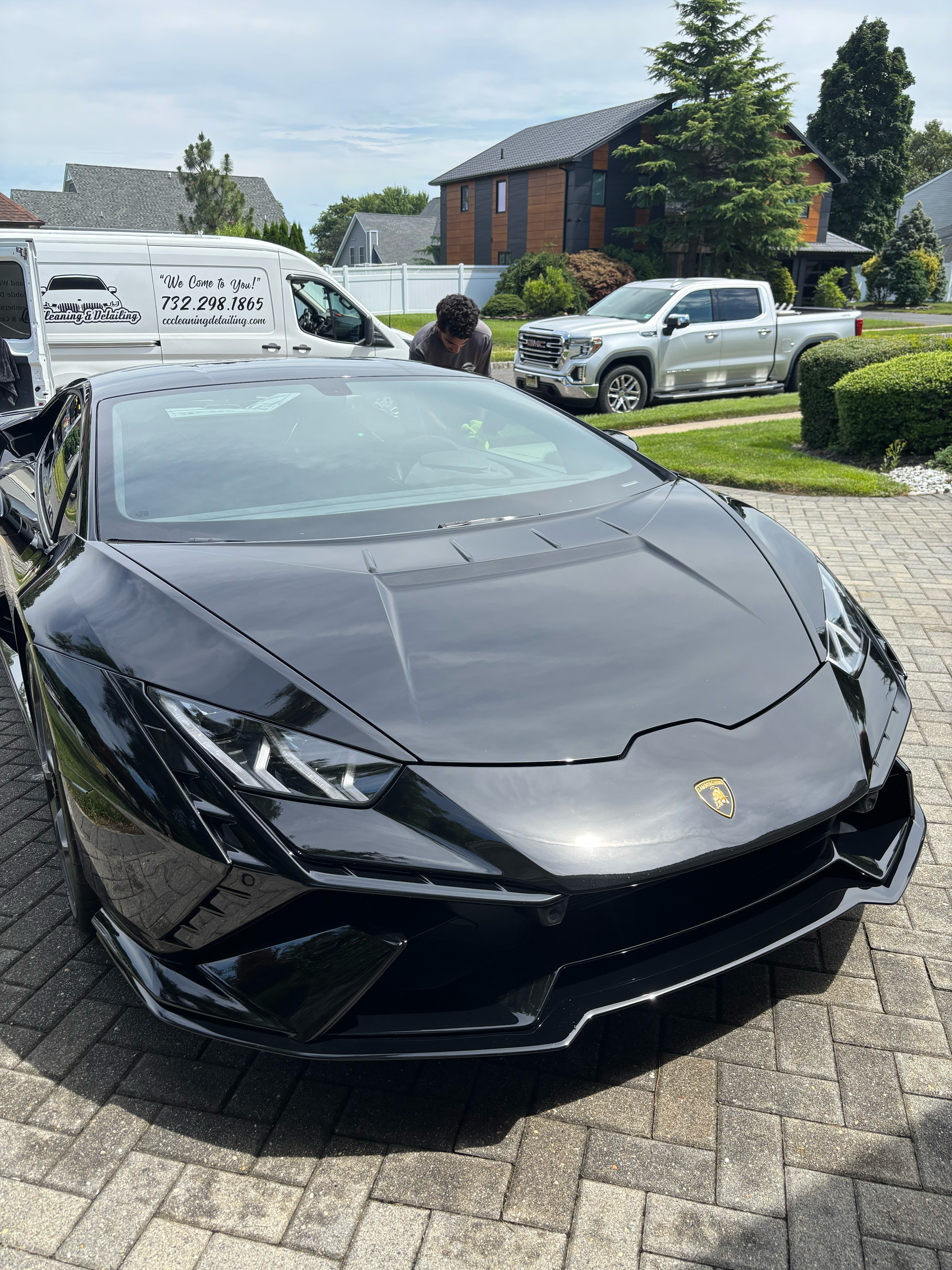 Black luxury sedan after exterior detailing and ceramic coating by CC Cleaning & Detailing NJ.