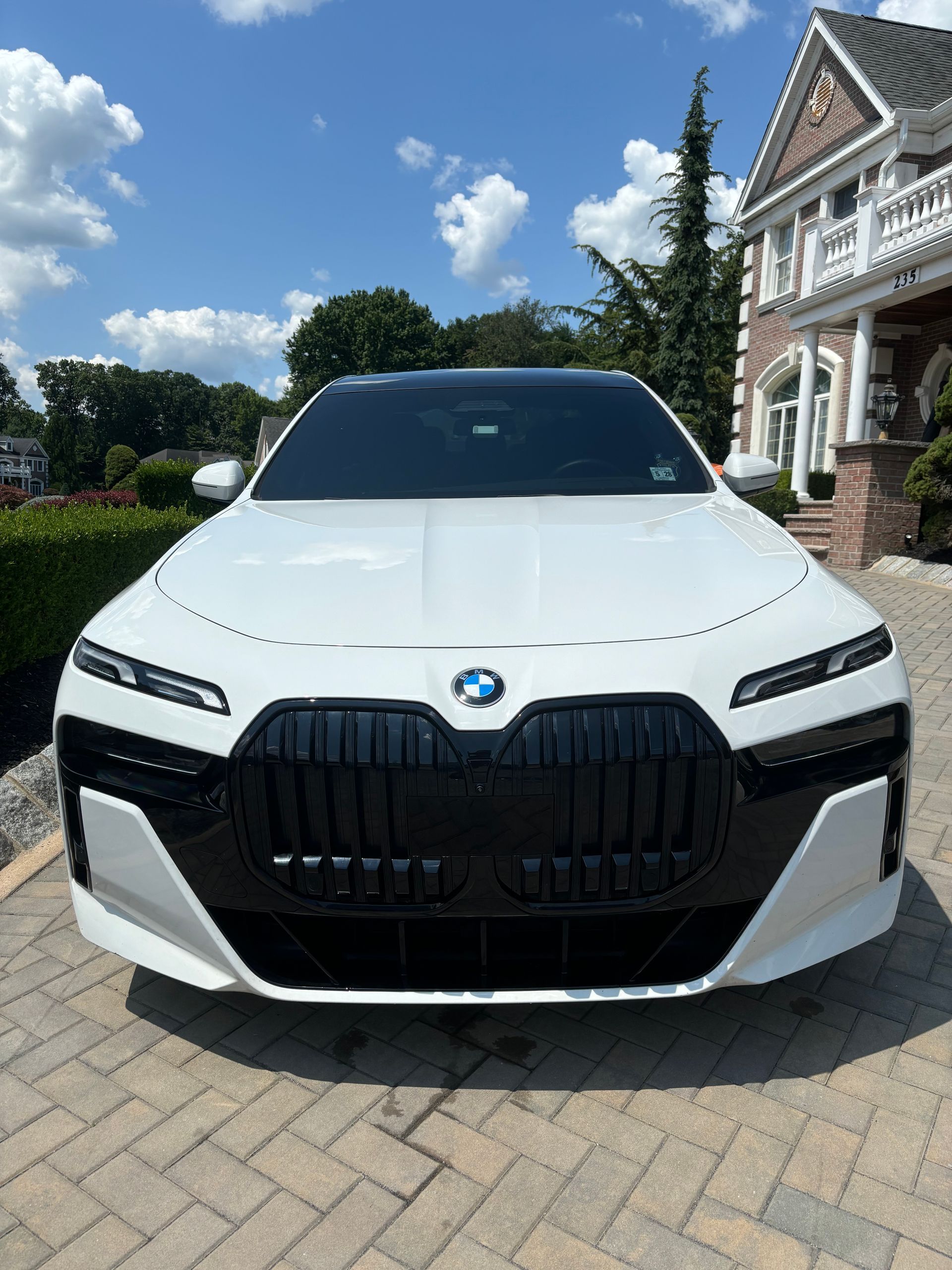 BMW sedan after professional ceramic coating and hand wash at residential detailing.