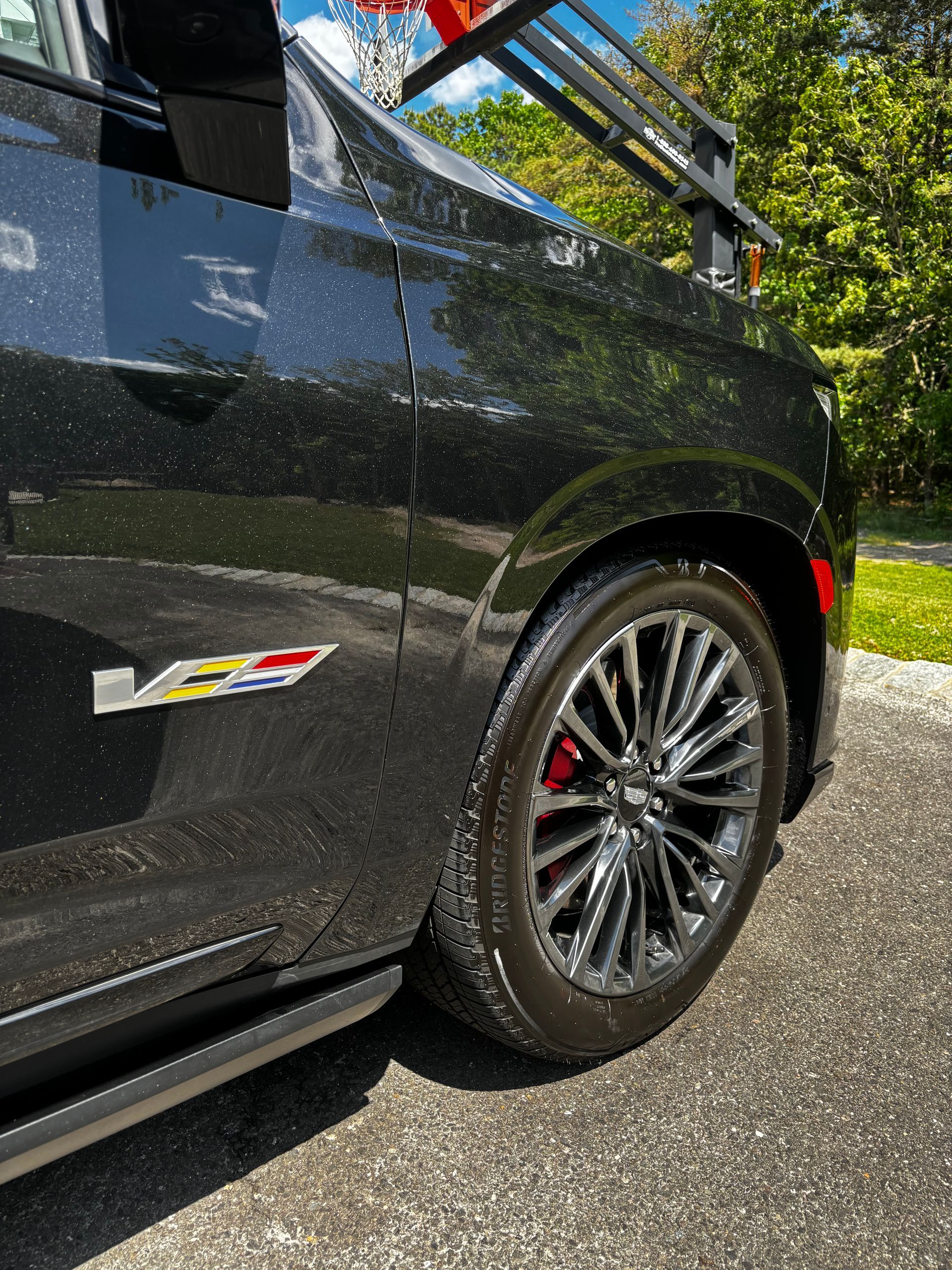 Black work van exterior cleaned and polished during mobile detailing service in NJ.