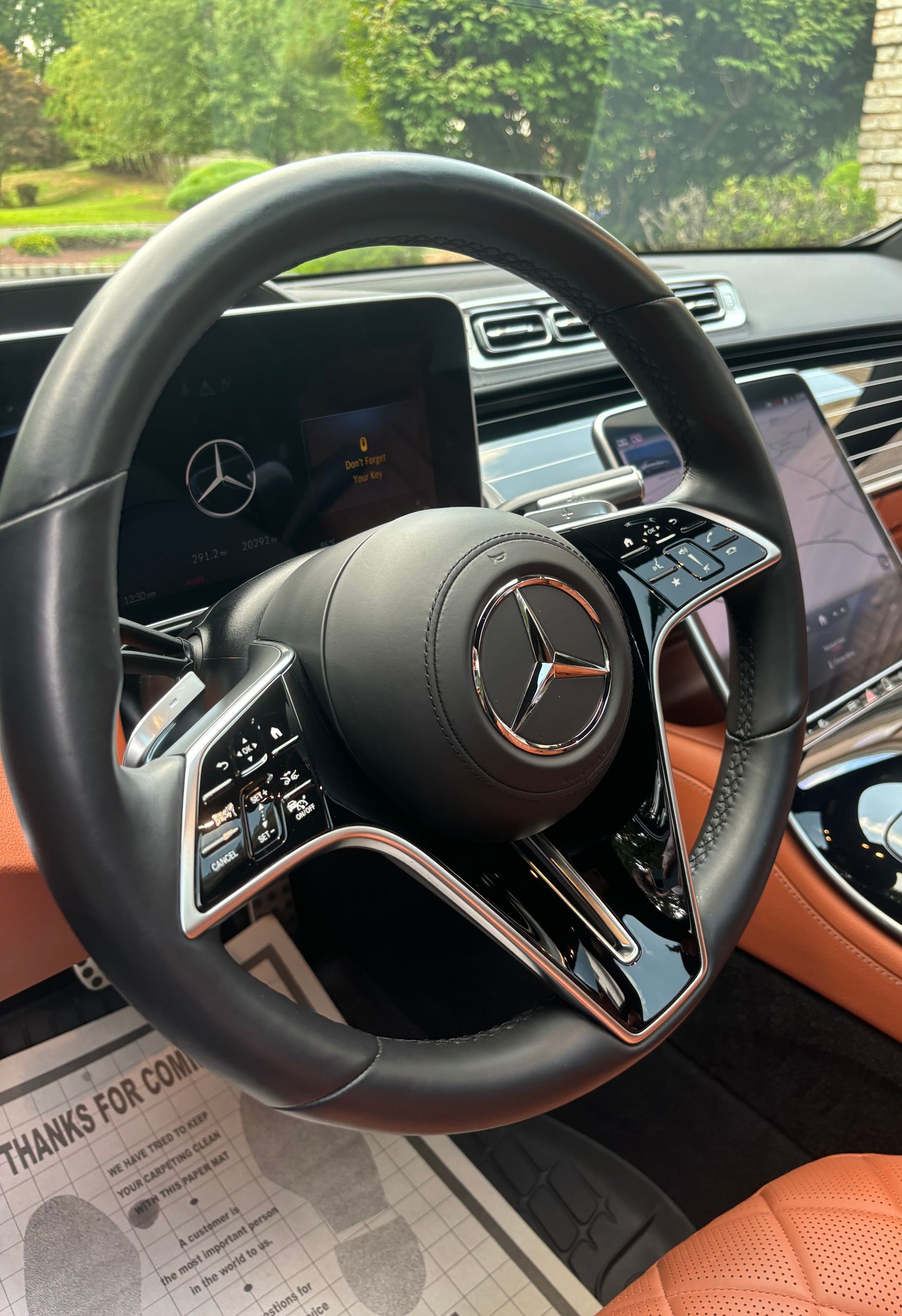 Mercedes-Benz dashboard and steering wheel after complete interior detailing service.
