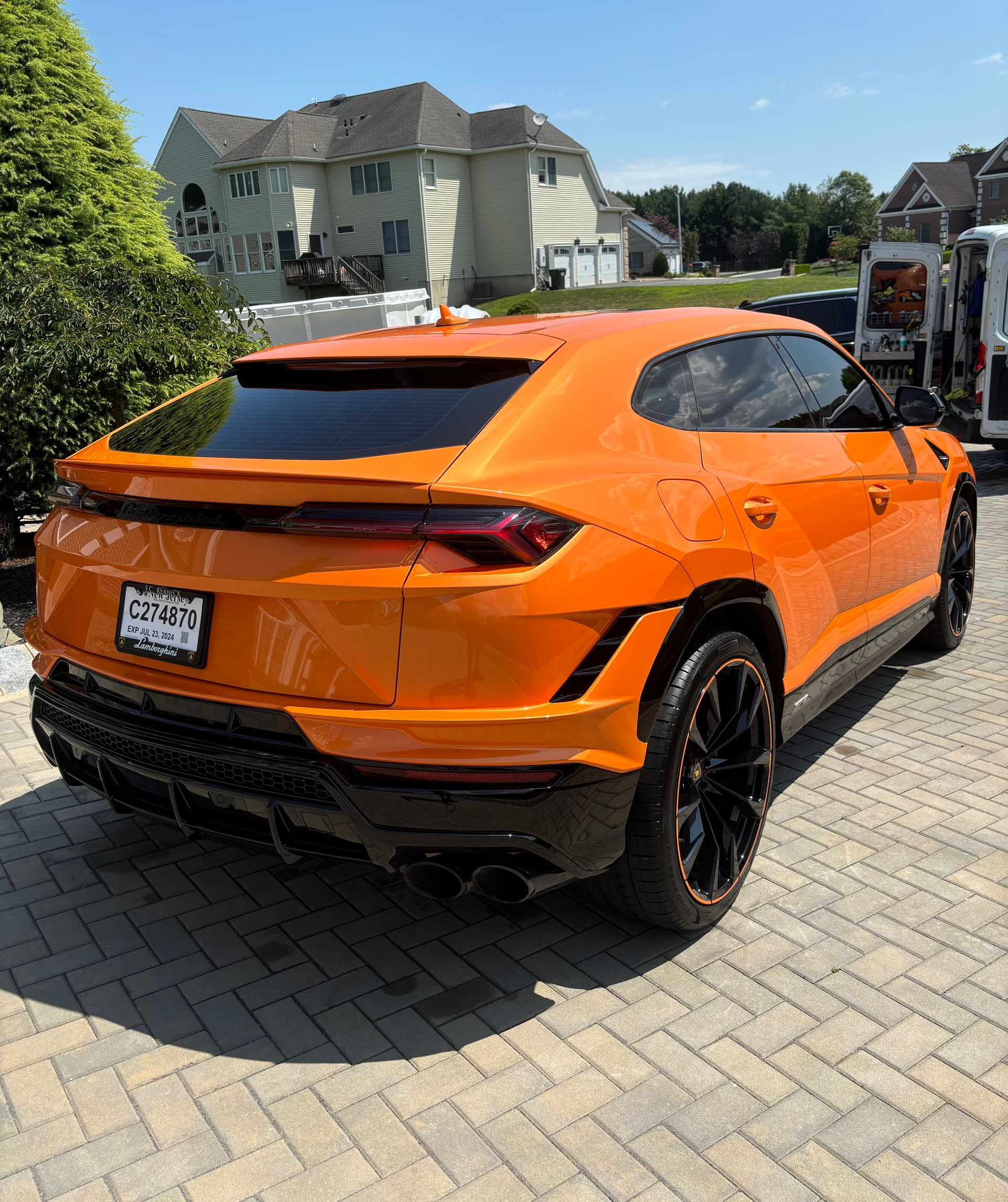 Orange Lamborghini Urus freshly detailed and polished to a flawless mirror finish.