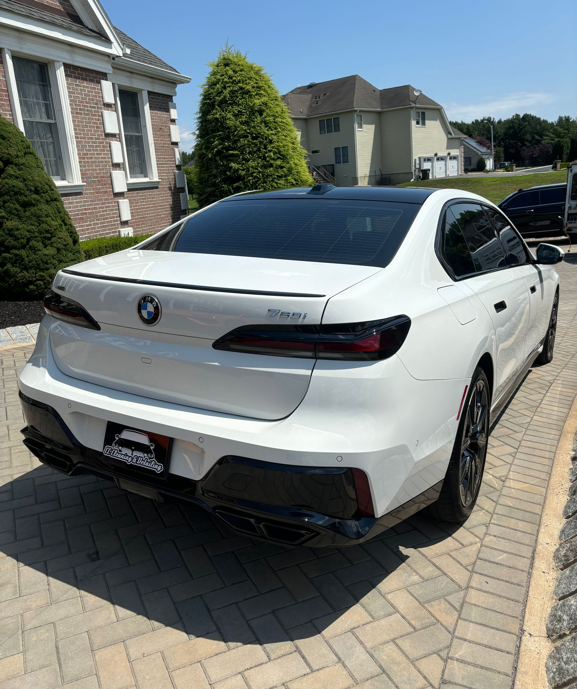 BMW rear view showing glossy paint finish after CC Cleaning & Detailing service.