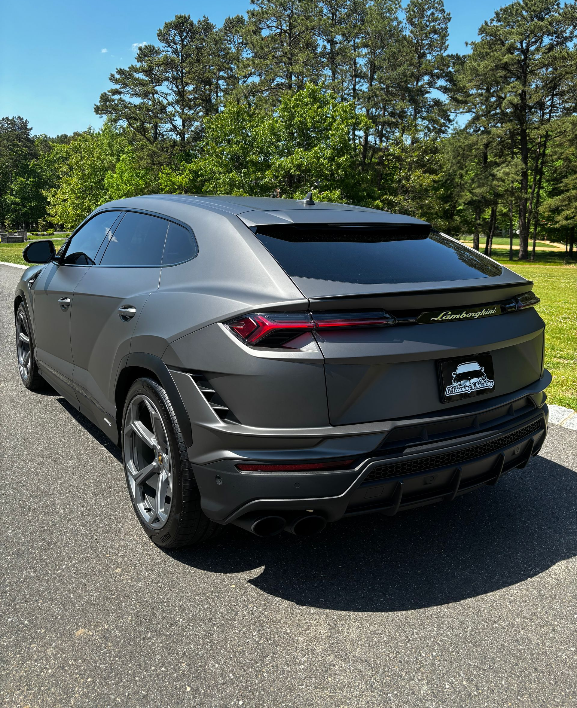 Matte gray Lamborghini SUV after exterior detailing and paint protection in New Jersey.