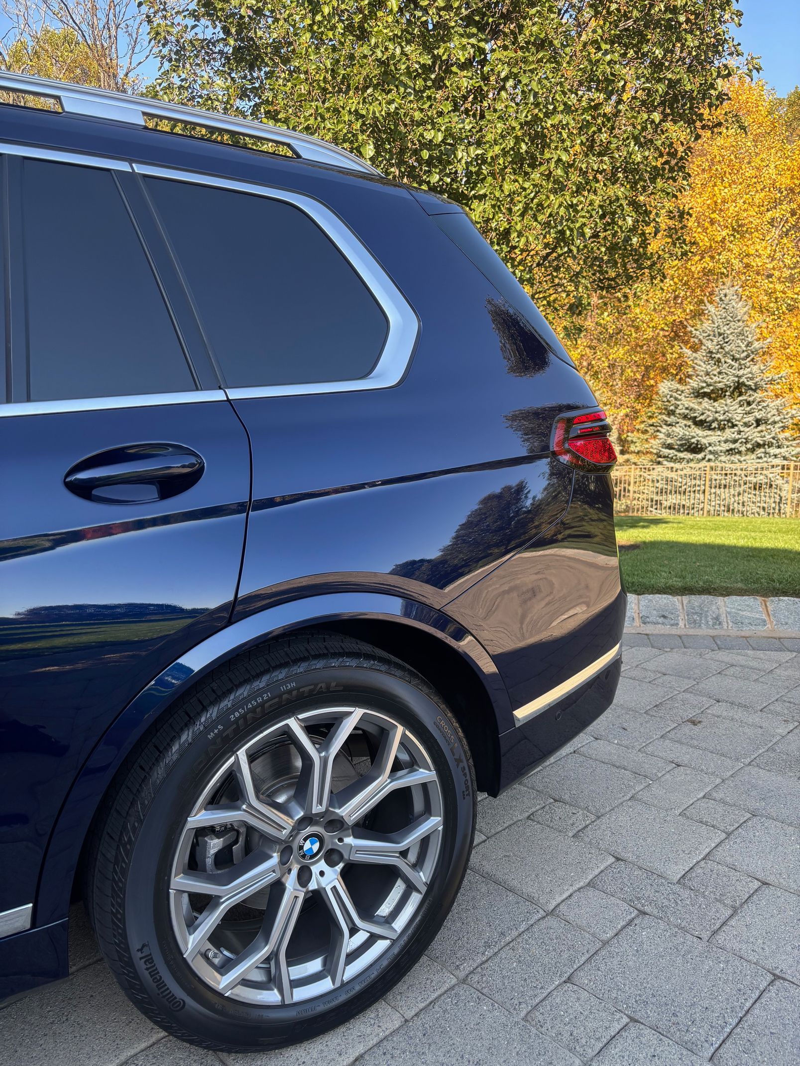 Blue SUV exterior shining after ceramic coating from CC Cleaning & Detailing LLC.