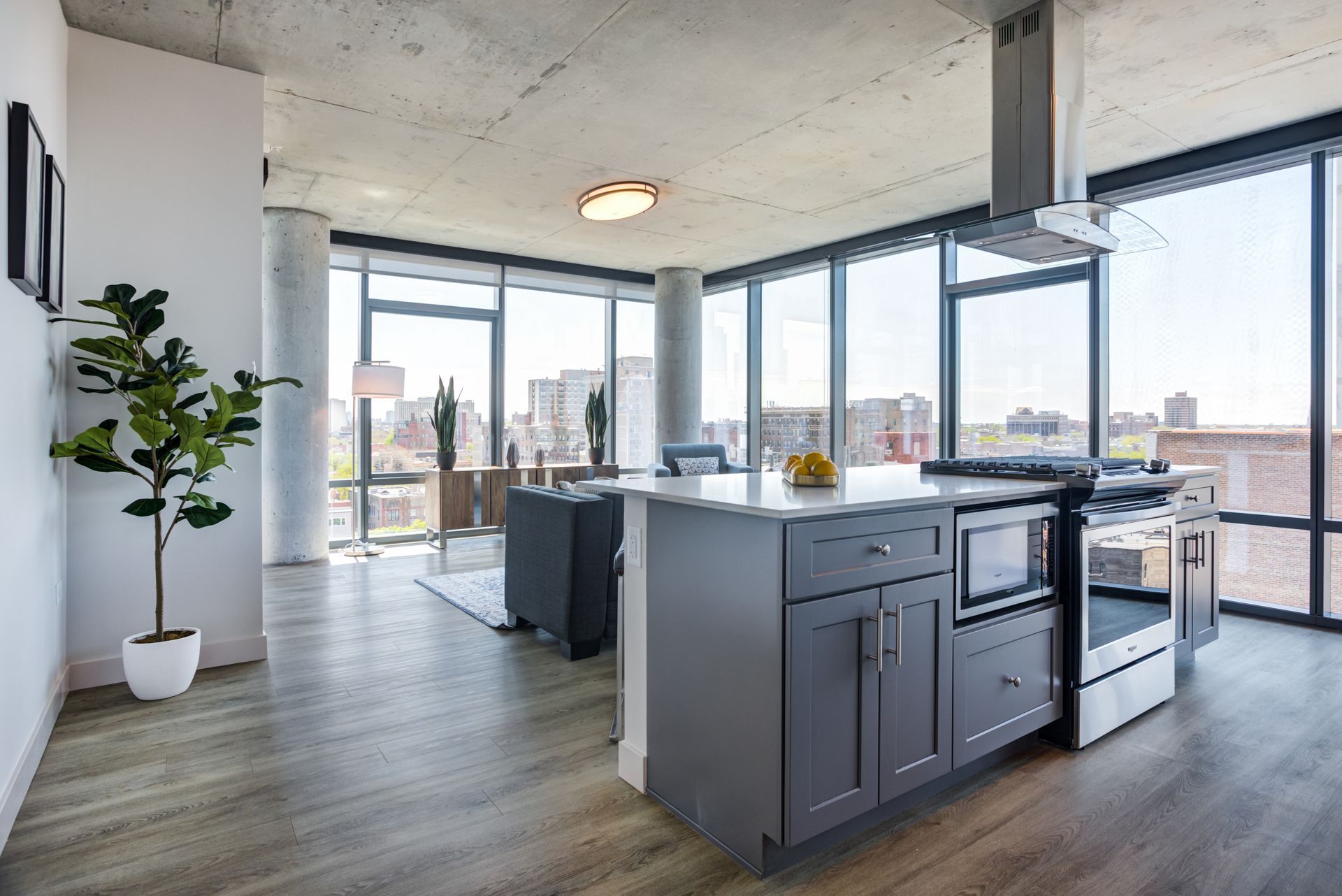 A kitchen with a large island in the middle of the room.